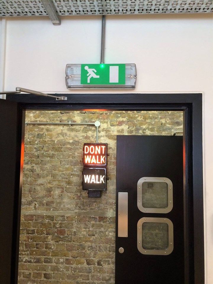 green exit sign by door