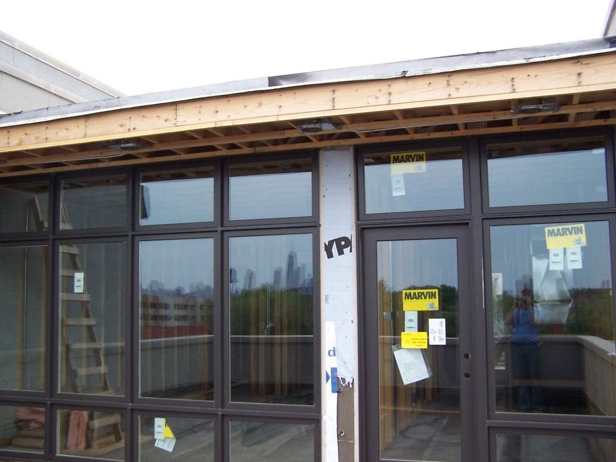 A building under construction with the number 17 on it