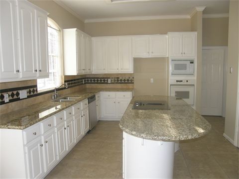 Kitchen with white cabinets