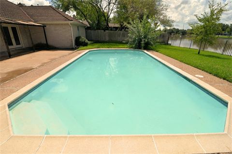 Pool in backyard of a house