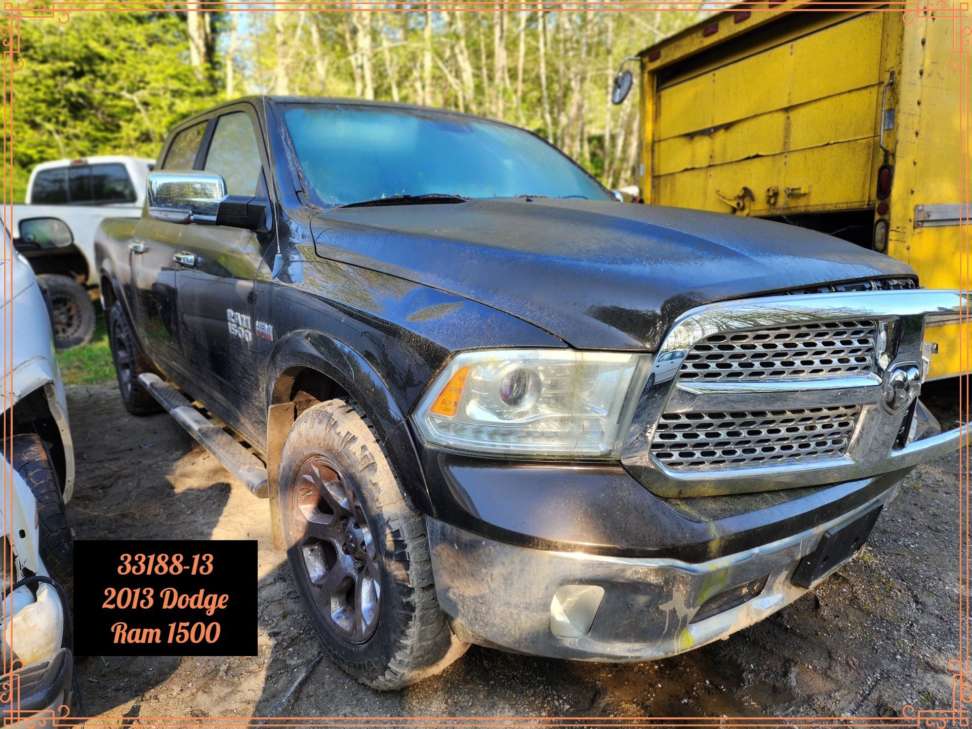 Black 2013 Dodge Ram 1500 truck parked outside.