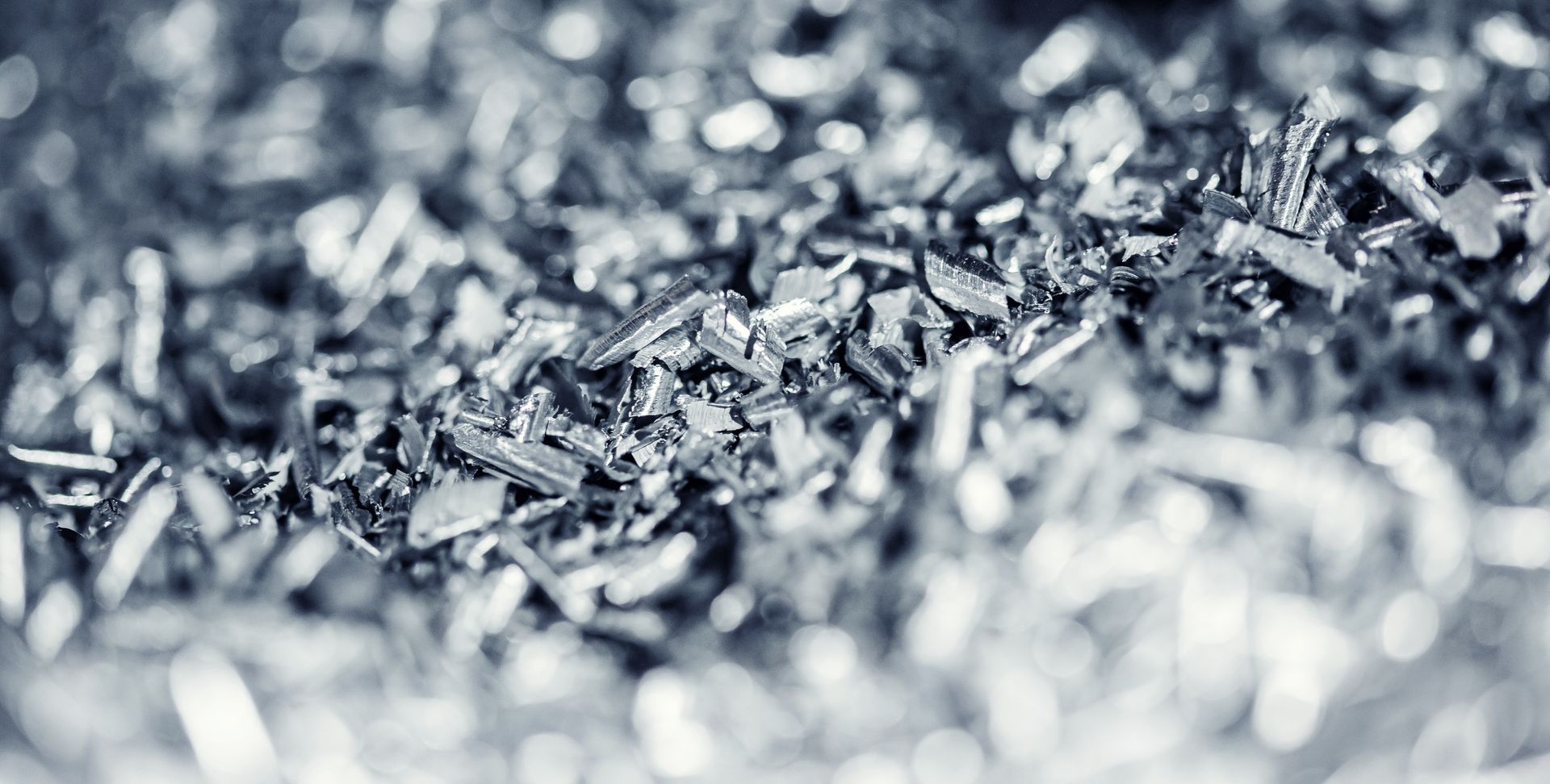 A close-up view of shiny metal scraps piled together for recycling.