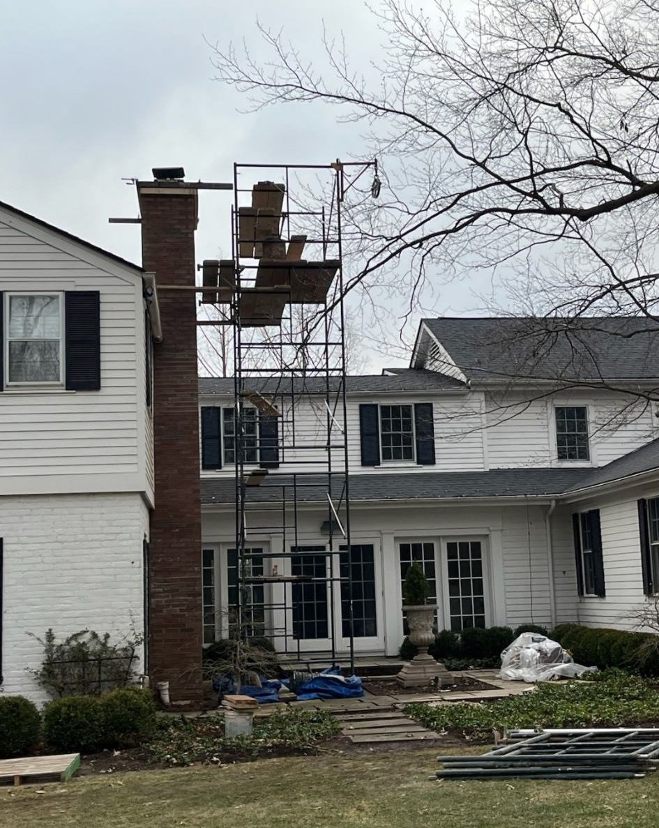 Exterior brick chimney masonry on two story Cincinnati home before repair and restoration