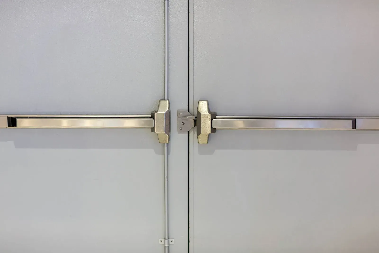 A Close Up Of A Door With A Panic Bar On It - Lynn Haven, FL - Coastal Keys Locksmith