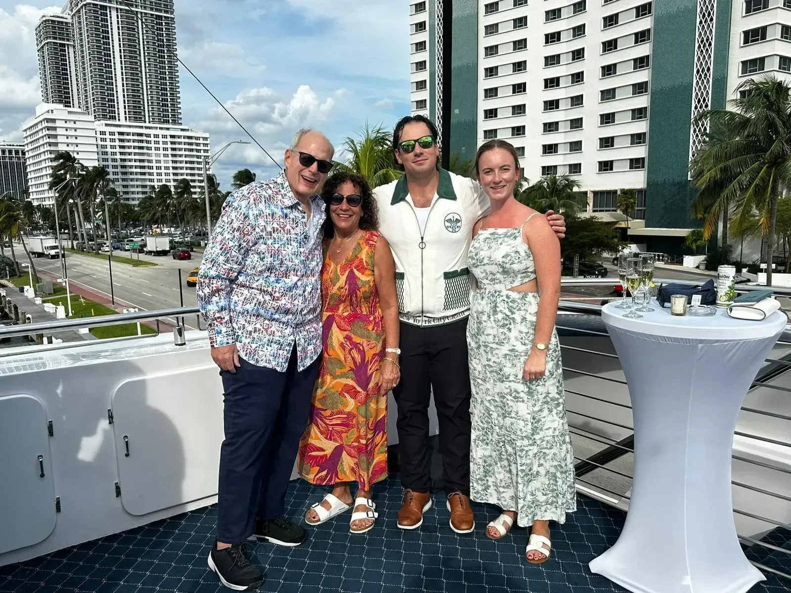 A group of people are posing for a picture on a boat.