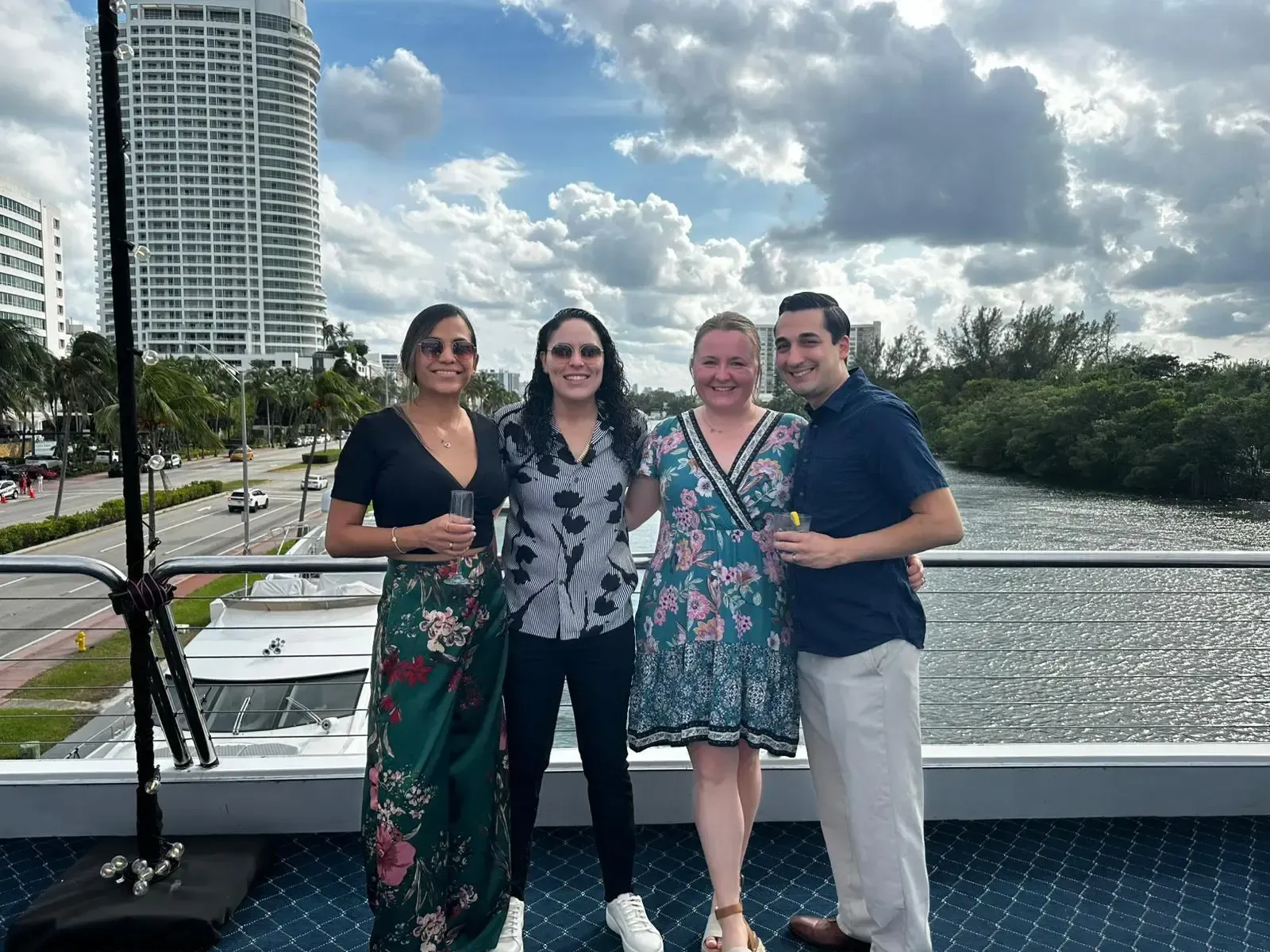 A group of people are posing for a picture on a boat.