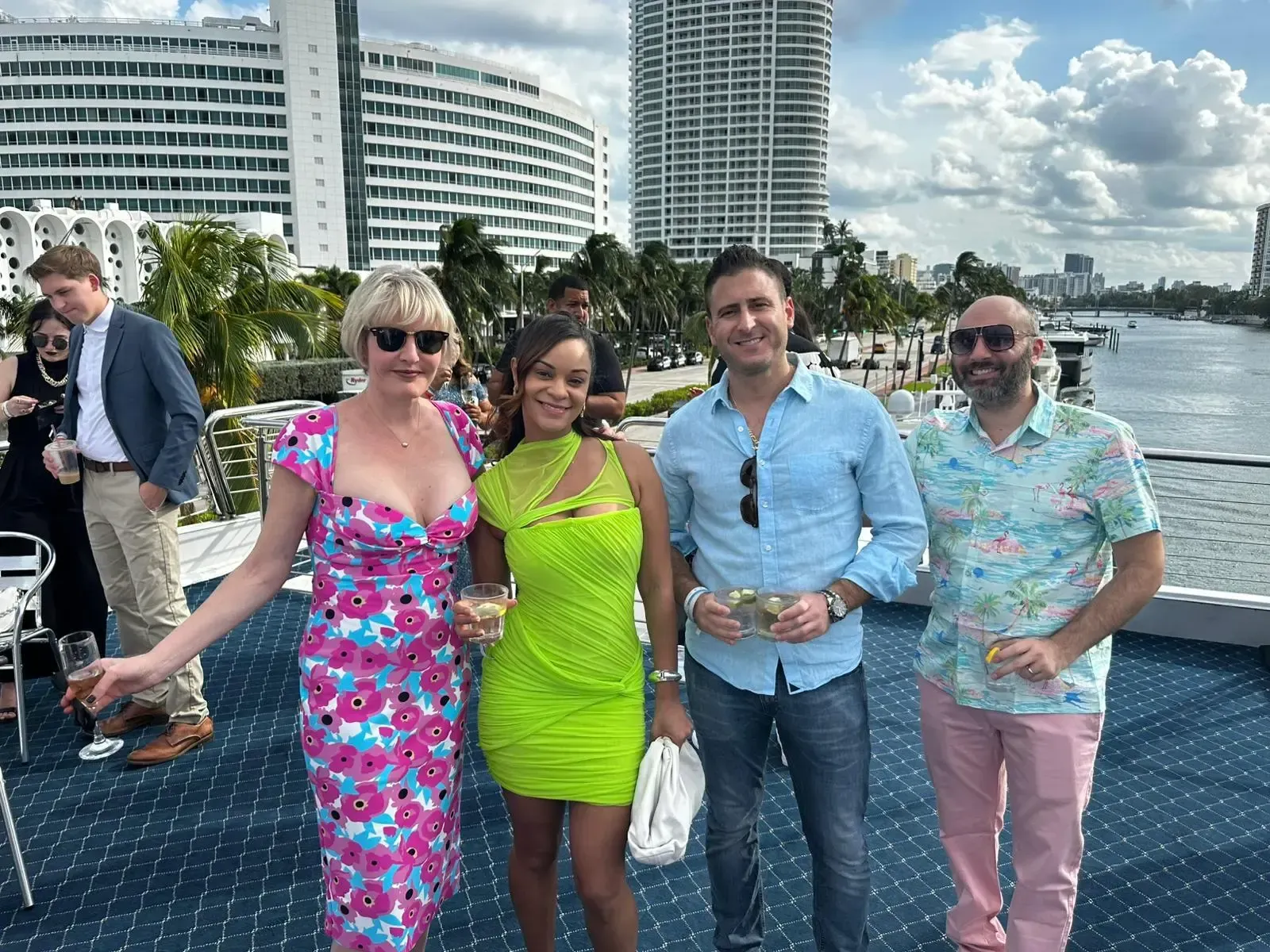 A group of people are posing for a picture on a boat.