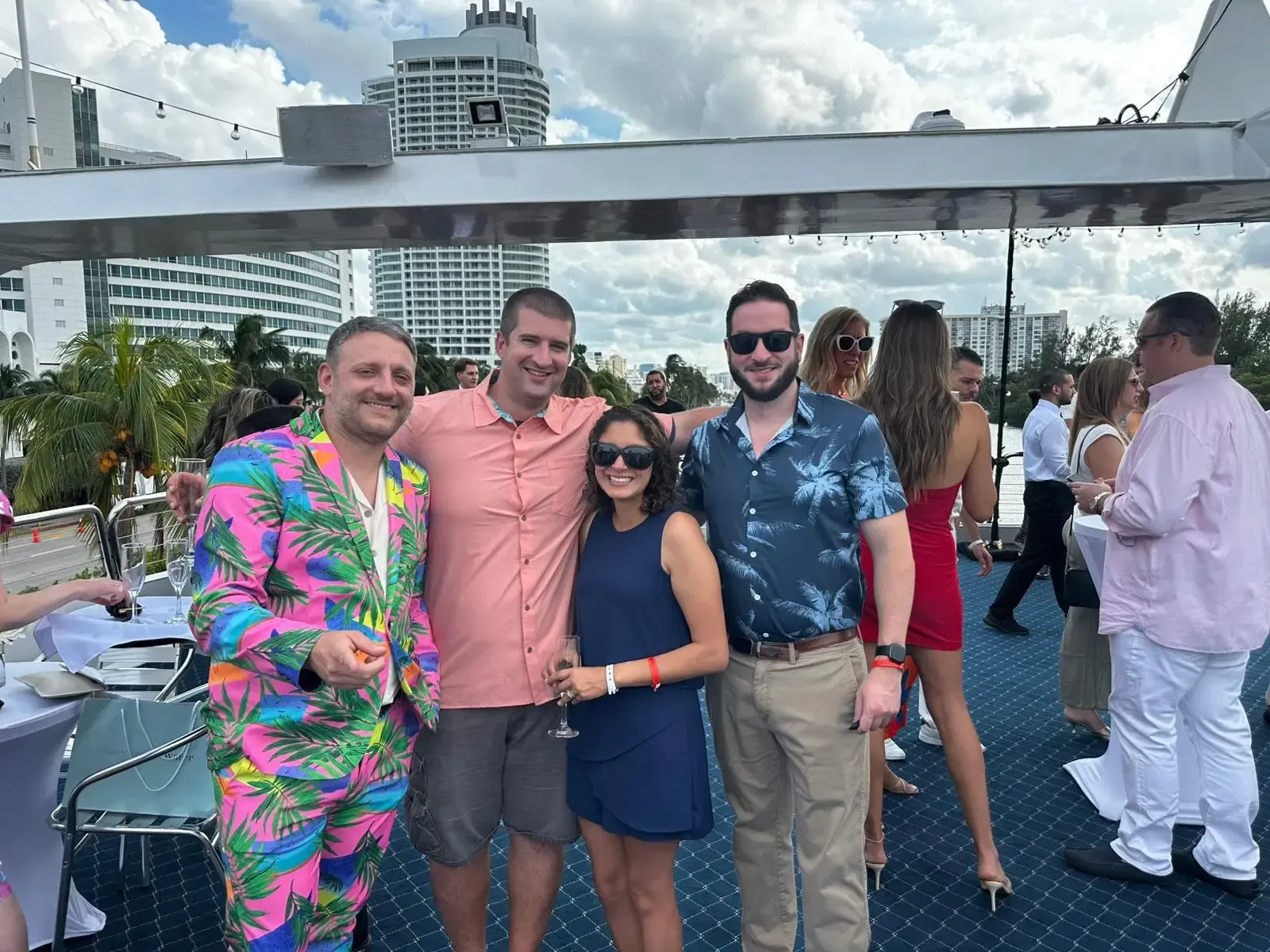 A group of people are posing for a picture on a boat.