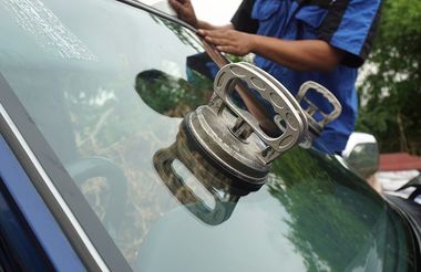 silver suction cups being used for windscreen replacement in grafton