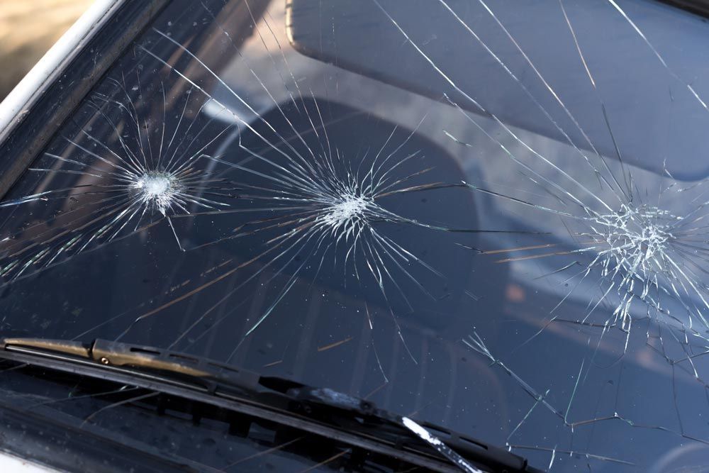 Damaged Windscreen Due To Fallen Rocks