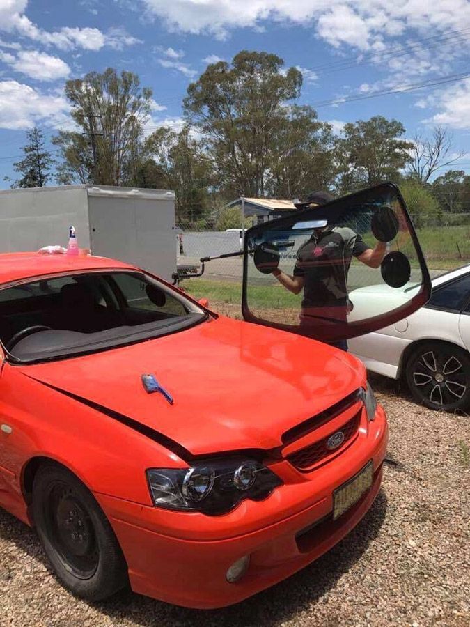 Windscreen Replacement on A Red Vehicle