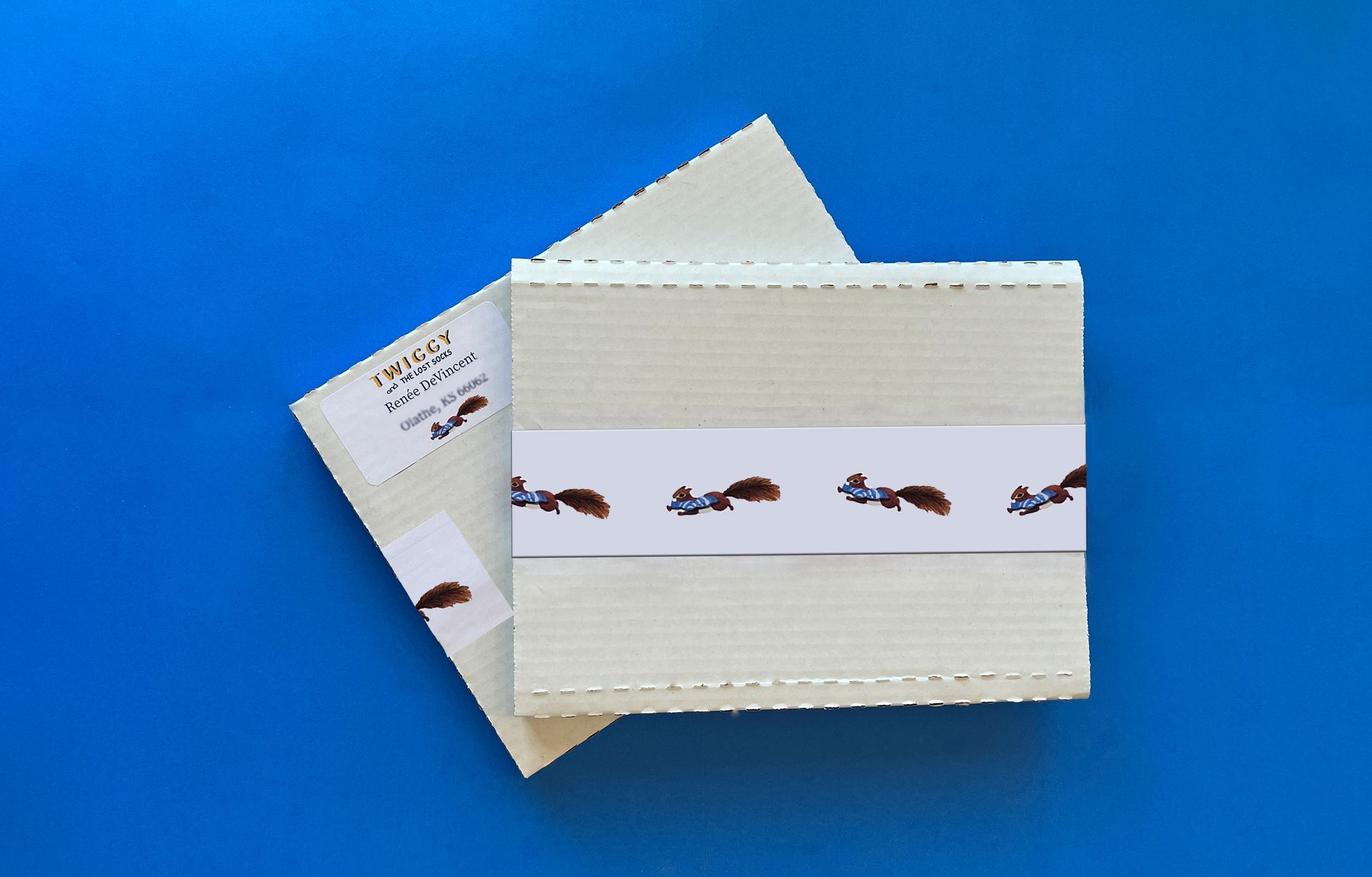 Stacks of square cream-colored fabric with decorative squirrel print, held together with a band and label, set on a blue background.