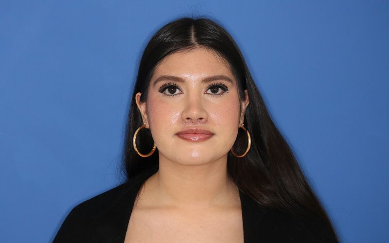 A close up of a woman 's lips and nose.