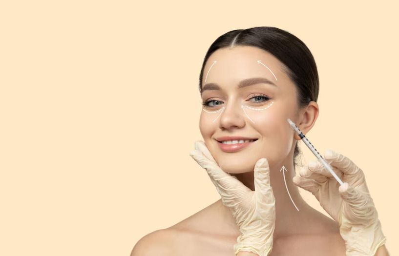 A woman is getting a botox injection in her face.