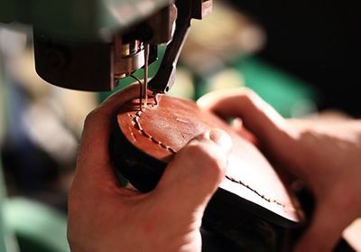 Shoemaker Sews Shoe — Beaverton, OR — Vanek's Shoe Repair