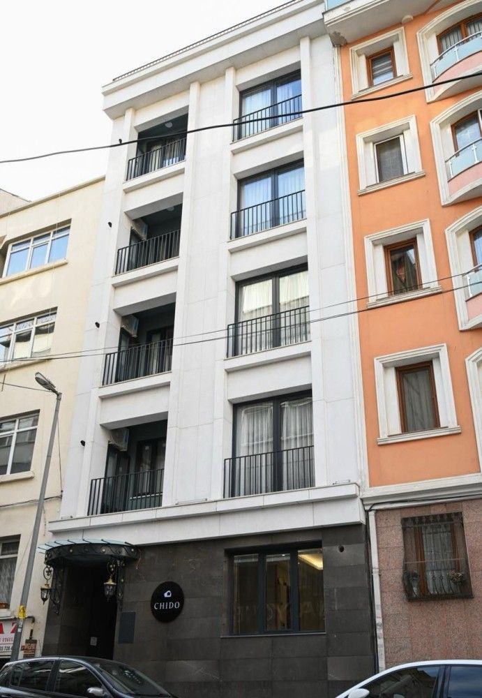 A building with a lot of windows and balconies