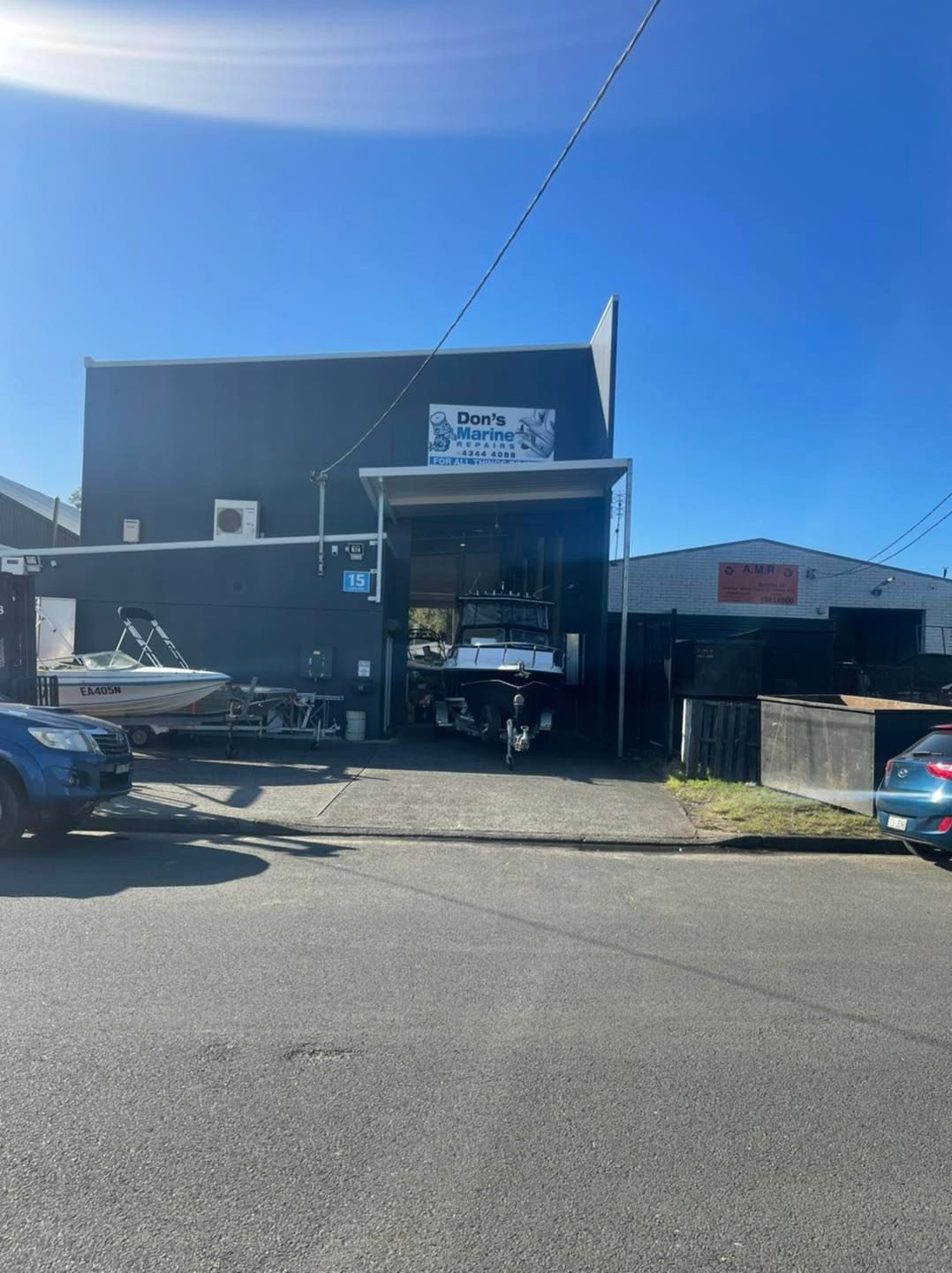 A Building with A Sign — Don's Marine Repairs in Brisbane Waters, NSW