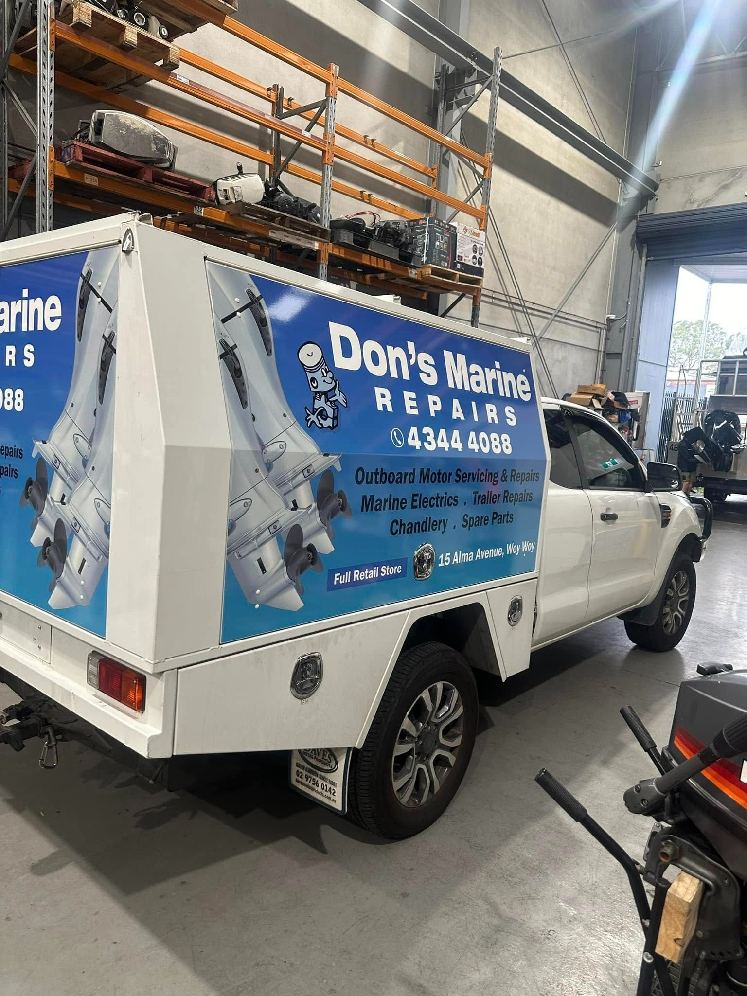 A White Truck with A Blue Sticker — Don's Marine Repairs in Gosford, NSW