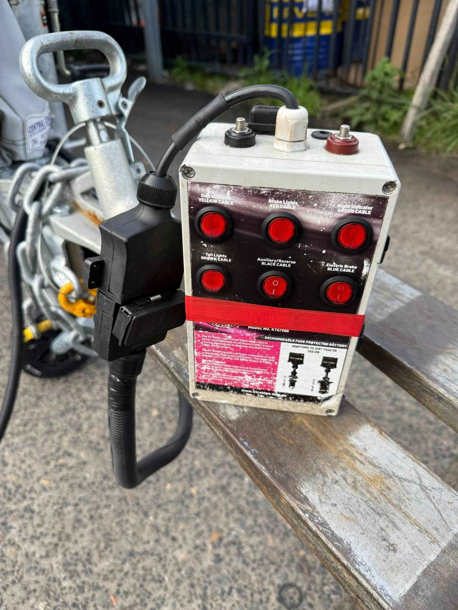 A Box with Red Buttons Is Sitting on A Wooden Bench — Don's Marine Repairs in Ettalong, NSW