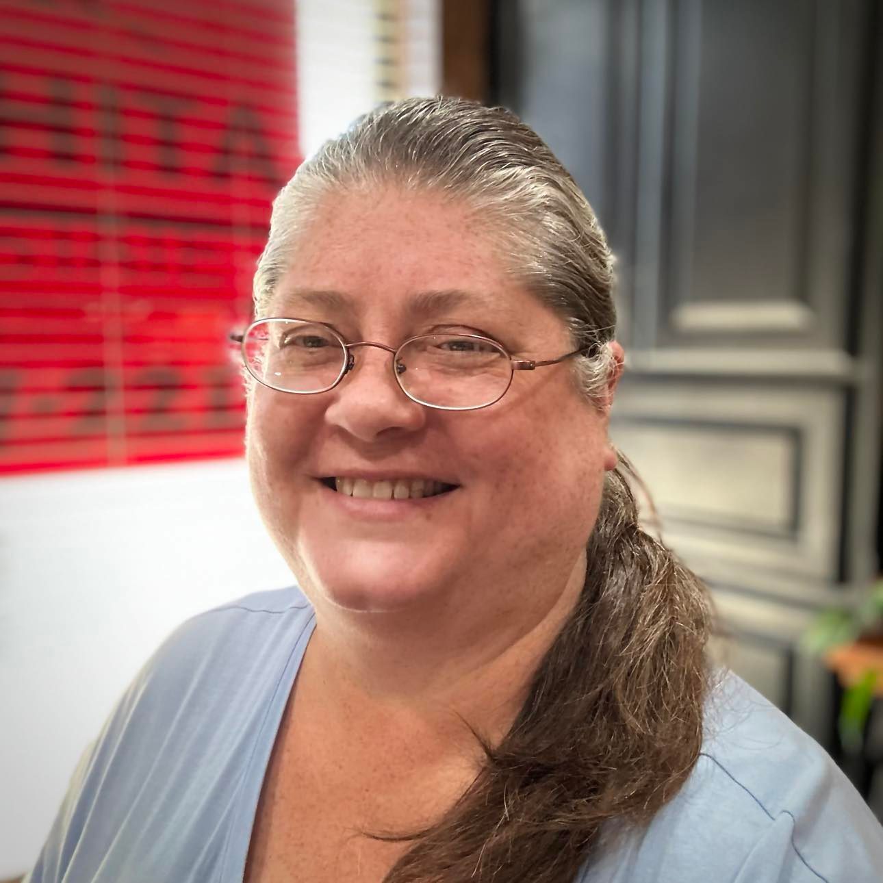 A house icon in a circle on a white background.