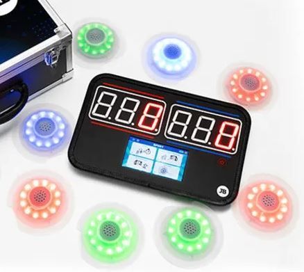 A set of color-changing target discs with a scoreboard and carrying case.