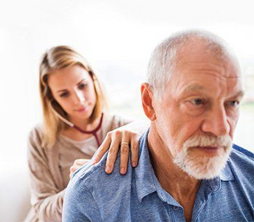 Care Worker Checking Elder Man's Breathing — St. Paul, Minnesota — Care Plus HHA Care Worker Checking Elder Man's Breathing — St. Paul, Minnesota — Care Plus HHA