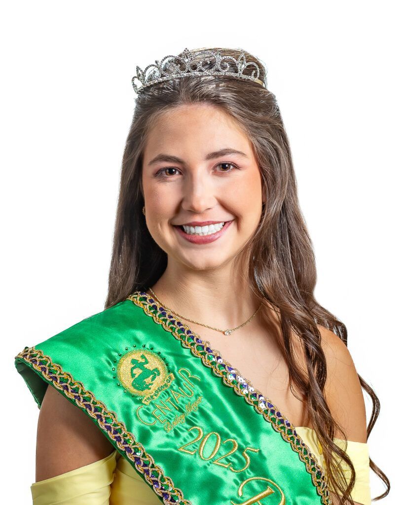 A woman wearing a green sash and a tiara