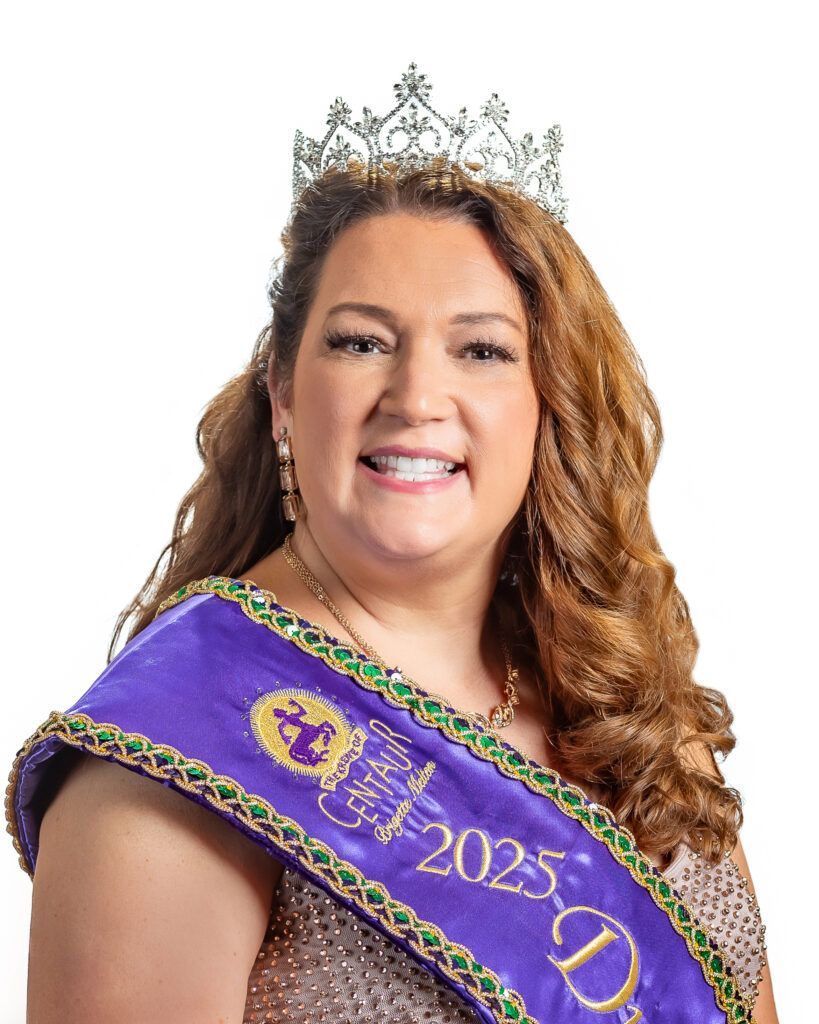 A woman wearing a tiara and a sash with the year 2025 on it