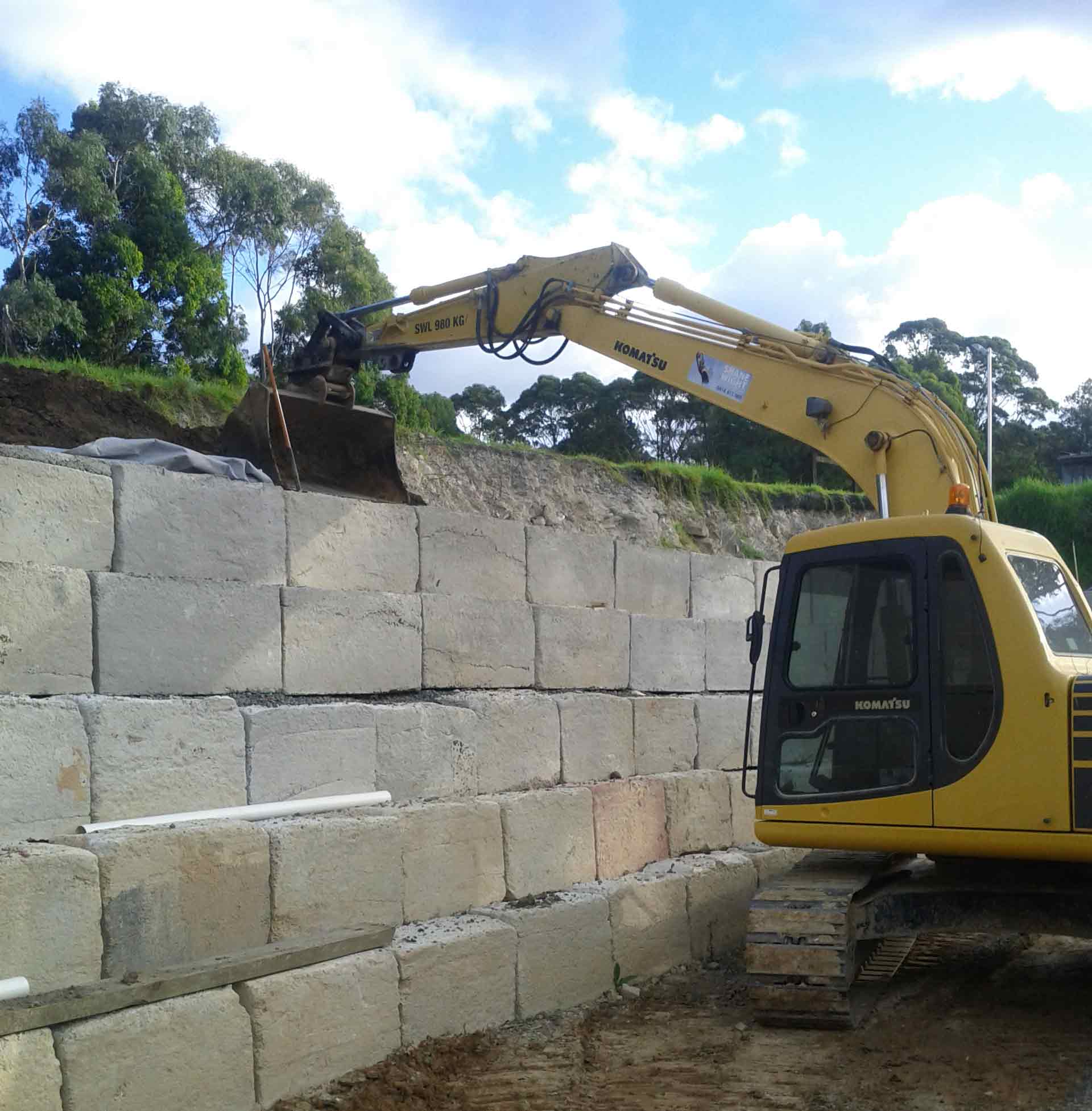 An Excavator Layering a Wall | Belrose, Nsw | Shane Wight Excavation