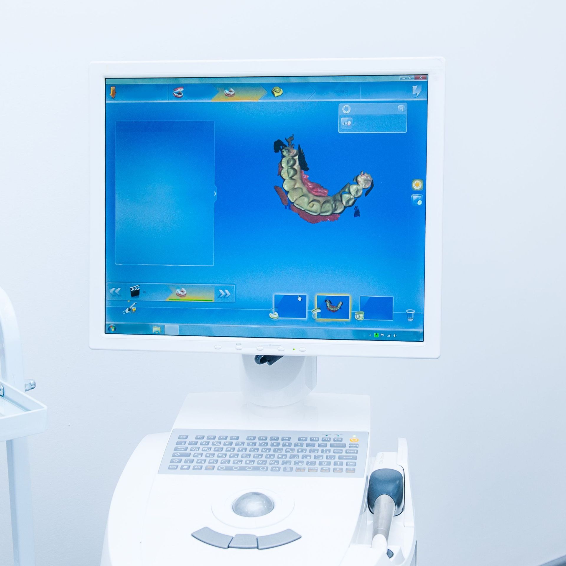 A computer monitor with a picture of teeth on it