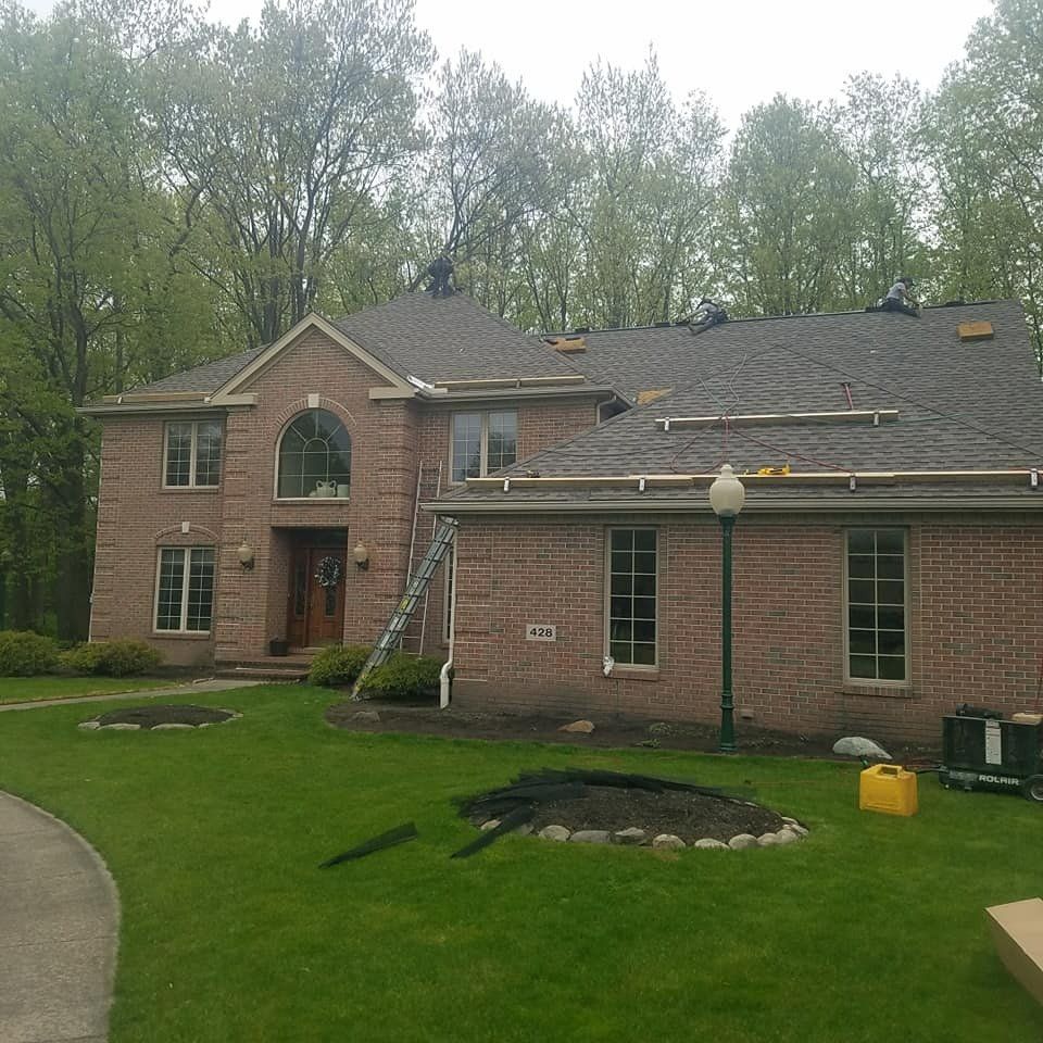 Roofers Repairing Roof – Saline, MI – Diversified Roofing