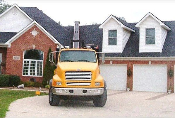 Yellow Truck – Saline, MI – Diversified Roofing