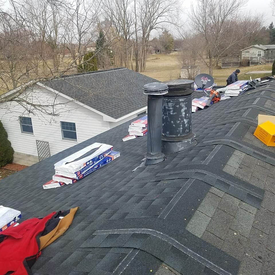 Workers Repair Asbestos Roof – Saline, MI – Diversified Roofing