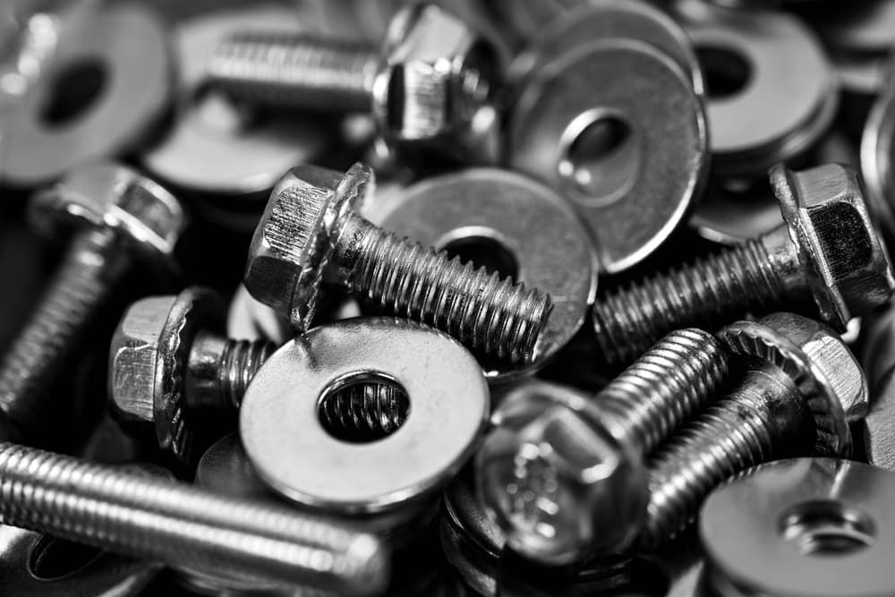 A Pile of Screws and Washers — FNQ Filters & Parts In Mareeba, QLD