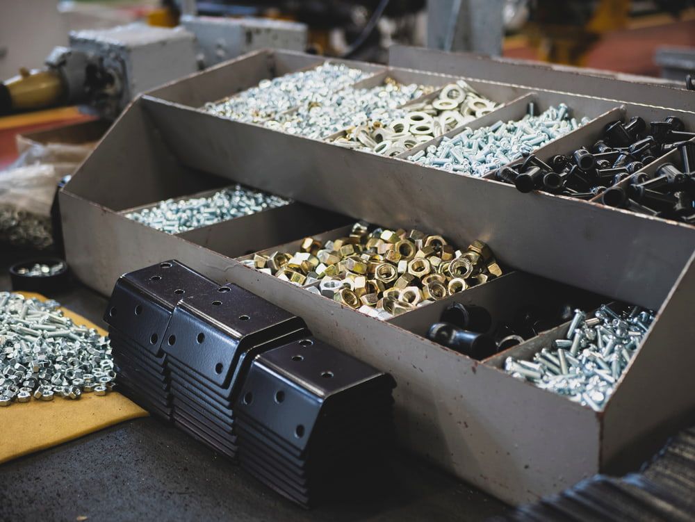 A Pile of Nuts and Bolts — FNQ Filters & Parts In Mareeba, QLD