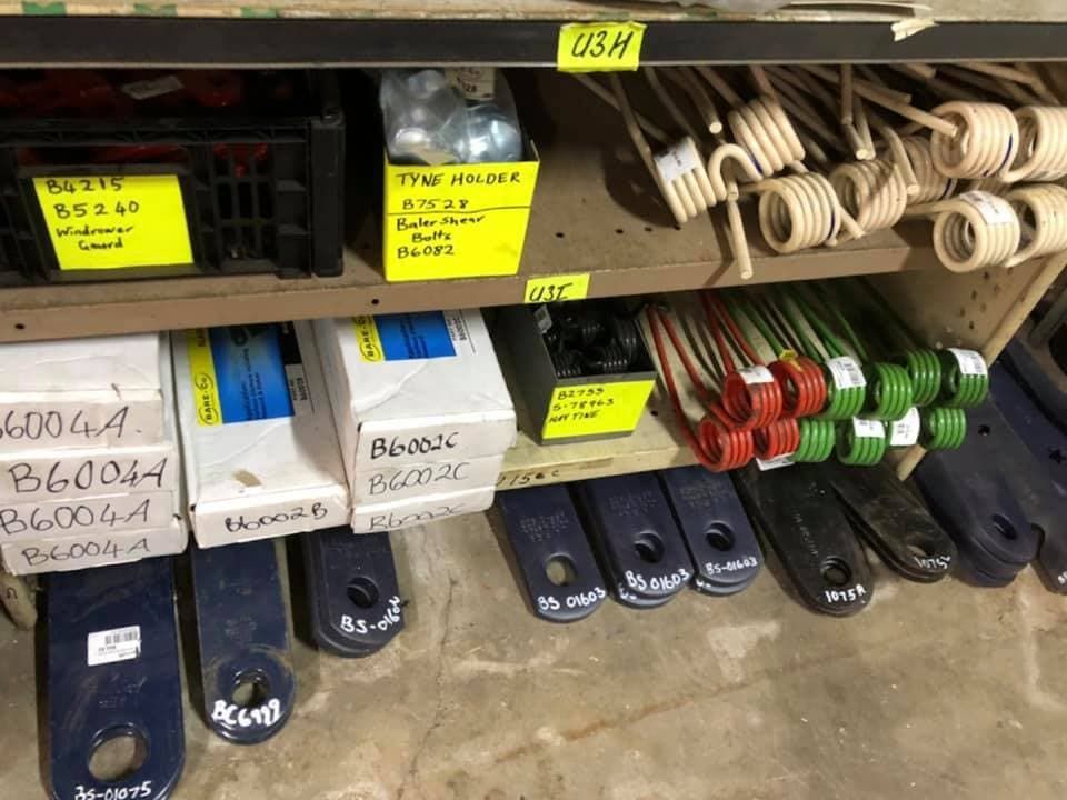 A Shelf Filled With Lots of Different Types of Springs — FNQ Filters & Parts In Mareeba, QLD