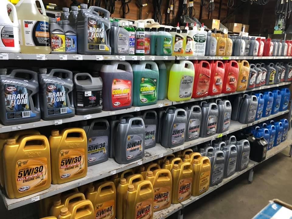 A Shelf Filled With Lots of Different Types of Oil — FNQ Filters & Parts In Mareeba, QLD