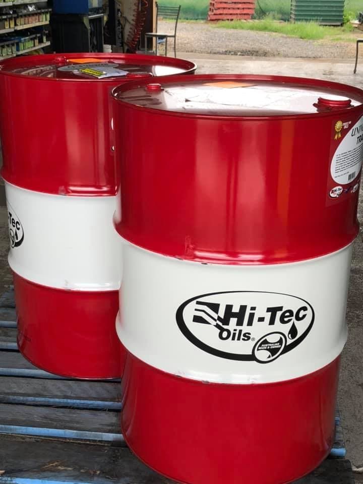 Two Red and White Barrels of Hi-tec Oils Are Sitting on a Pallet — FNQ Filters & Parts In Mareeba, QLD