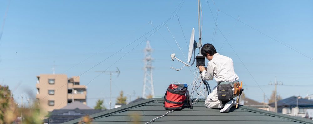 Antenna Repair Works On The Rooftop