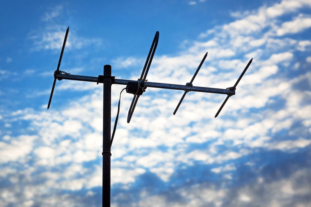 TV Antenna With Blue Sky Background
