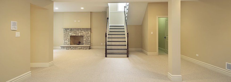 Cream room with cream carpet flooring