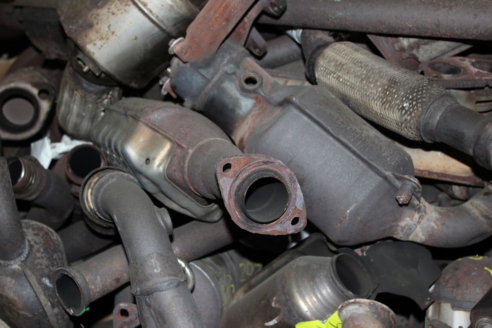 Pile of Used Catalytic Converters and Metal — Fulgi's South Coast Automotive and Dismantling in South Nowra, NSW
