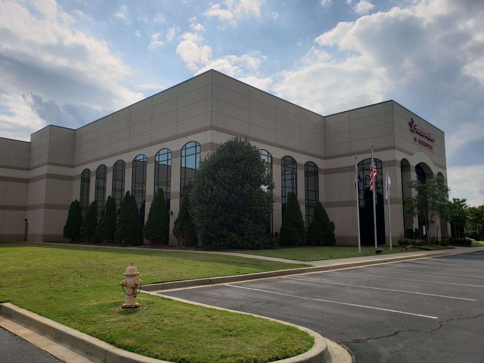 Budweiser Building Window Siding — Spartanburg County, SC — Kapasi Glass Mart