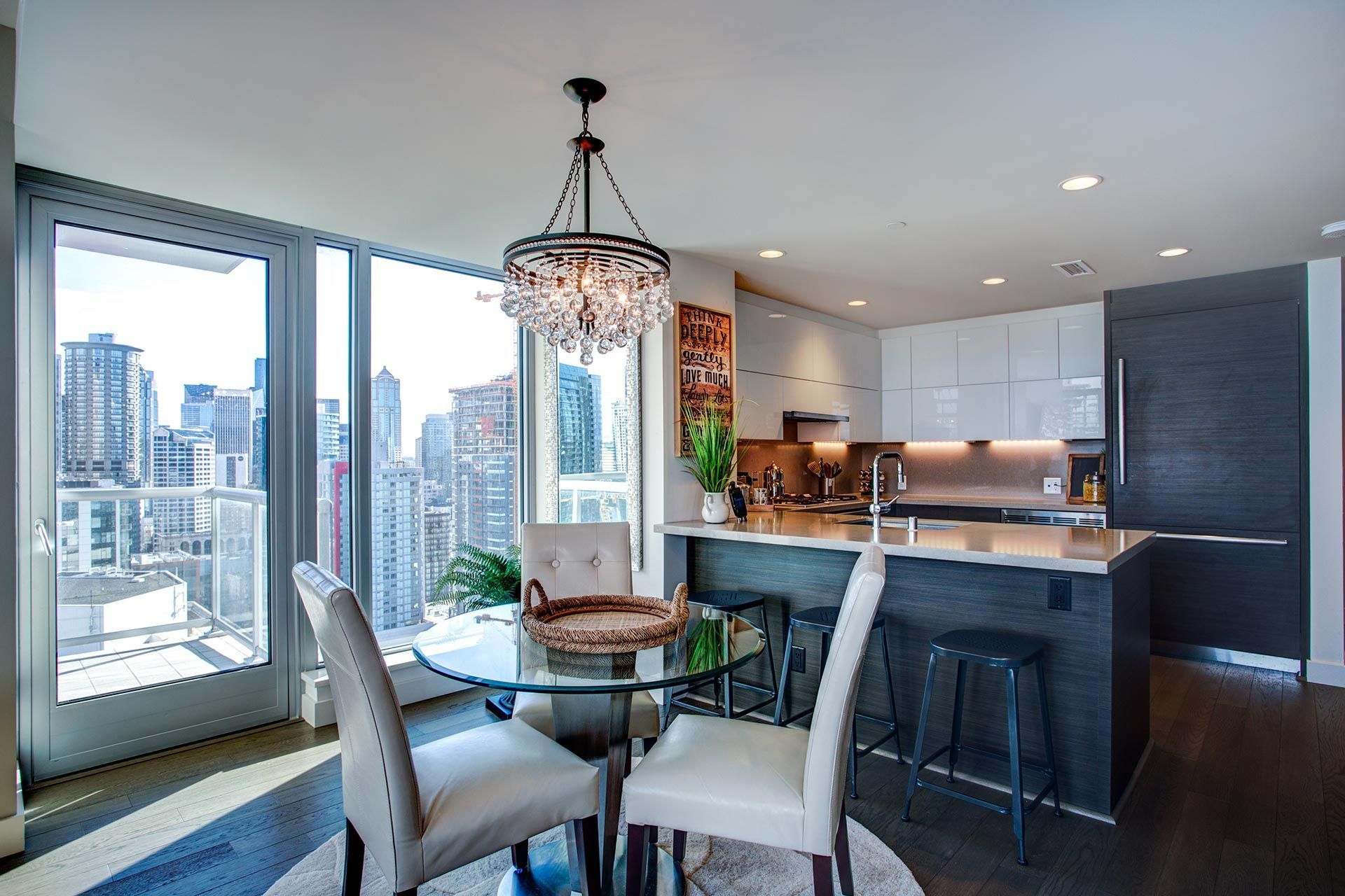 Light filled apartment interior with open floor plan.