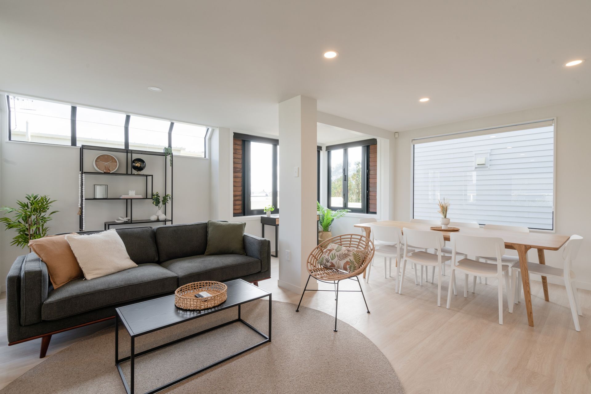 Modern furnished apartment for rent with cozy living room, stylish décor, and natural lighting.