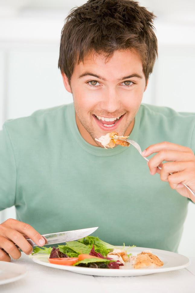 Boy Wearing A Plain Shirt Eating Salad — Cornelius, NC — Corporate Relocation Inc