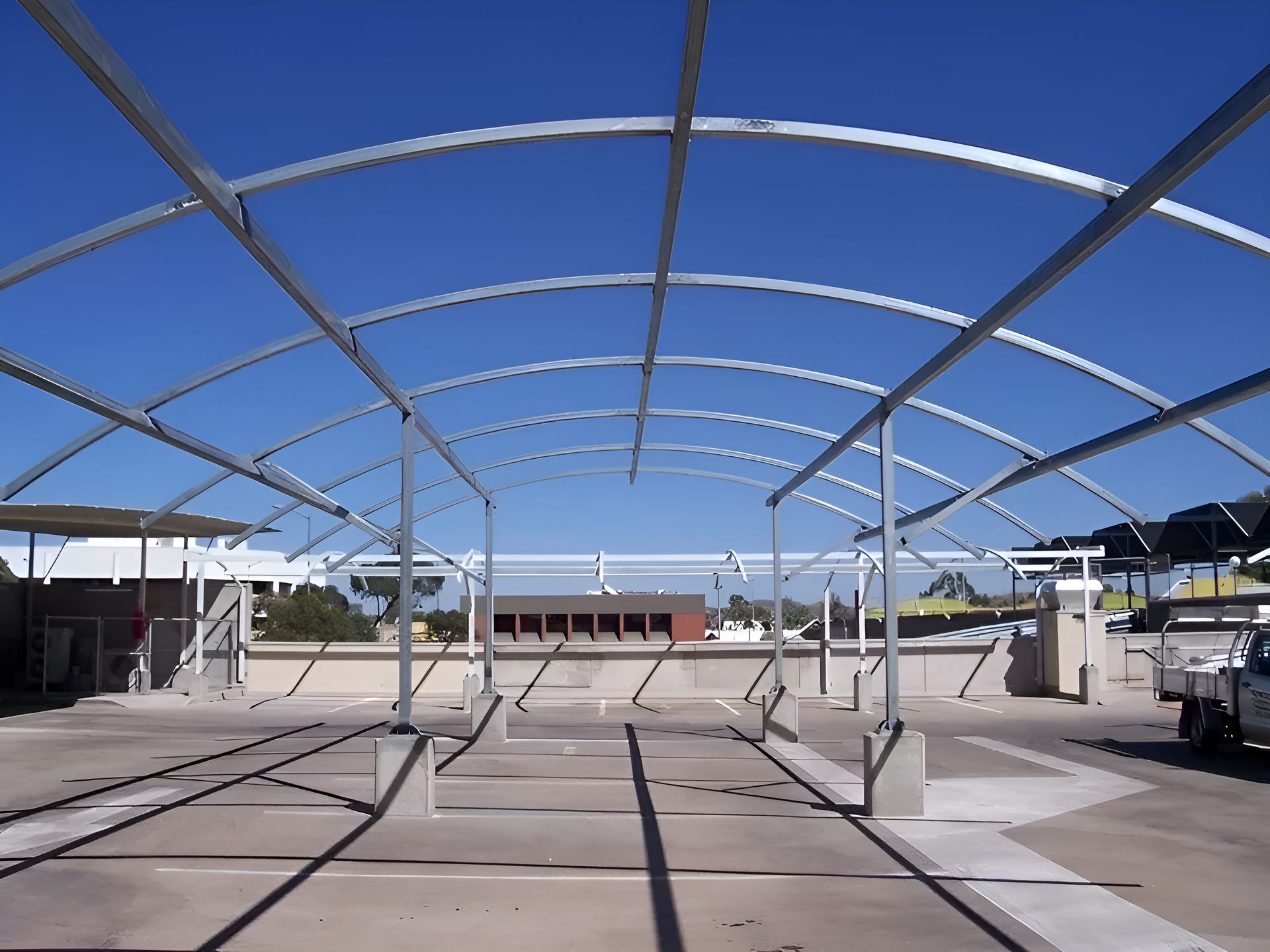 A Large Metal Structure With A Blue Sky In The Background — Sno's Welding In Ciccone, NT