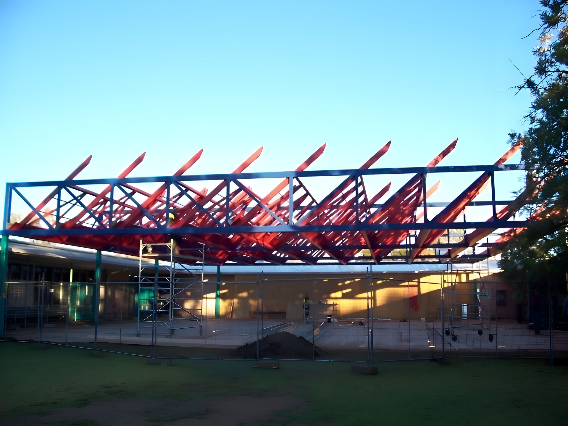 A Building Under Construction With A Blue Sky In The Background — Sno's Welding In Ciccone, NT