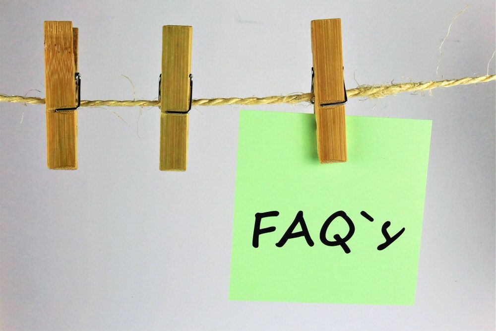 A Green Sticky Note With The Word Faq's Written On It — South Burnett Truck Rental In Childers, QLD