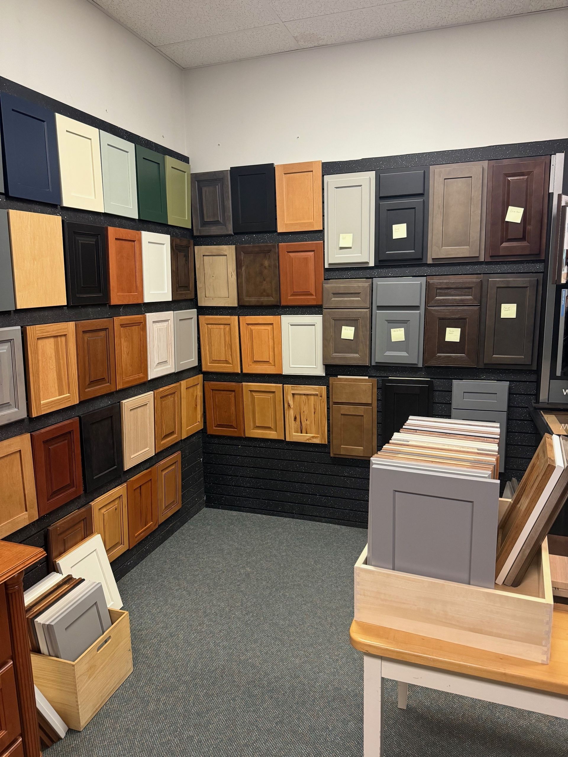 A room filled with cabinets of different colors and sizes